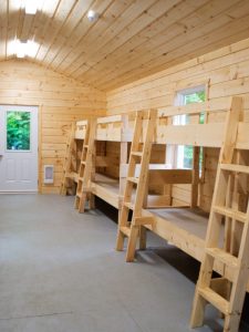 Student cabin accommodations during school group visits to Wenonah Outdoor Education Centre program in Muskoka Ontario